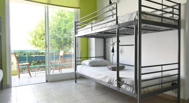 Кровать в общем номере Lemongrass Hostel