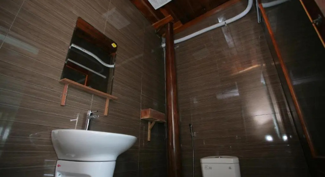 Кровать в общем номере Ngoc's Garden House