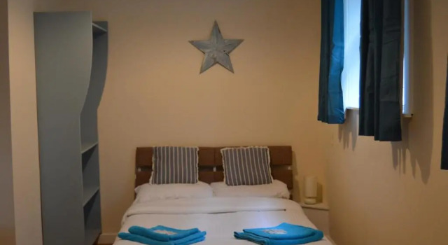 Апартаменты Central Cove Guesthouse