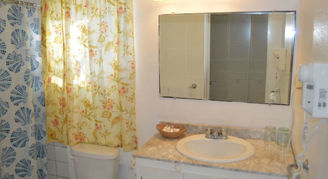Четырёхместный номер Deluxe с балконом Oualie Beach Resort