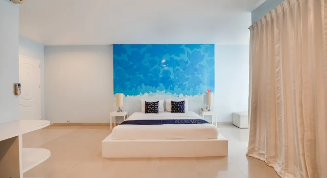 Двухместный номер Deluxe с видом на бассейн Capital O 998 The Magnolias Pattaya Boutique Resort