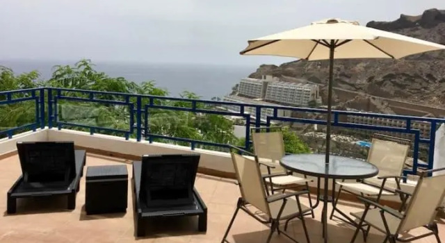 Апартаменты Apartment in Taurito with dream landscape and 30m2 terrace.