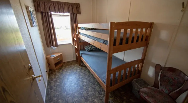Кровать в общем номере Hotel Breidavik
