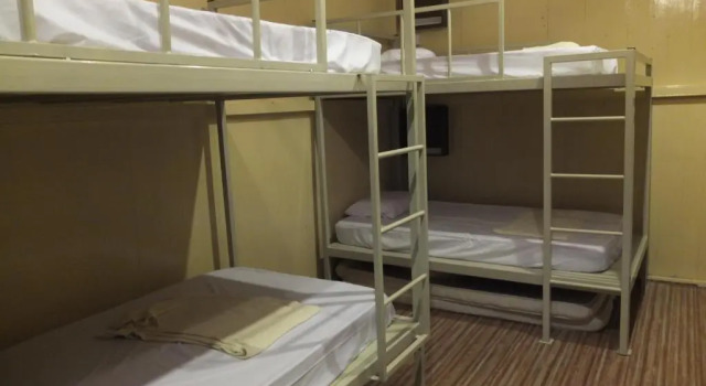 Кровать в общем номере Muntri House by Virtue Hospitality
