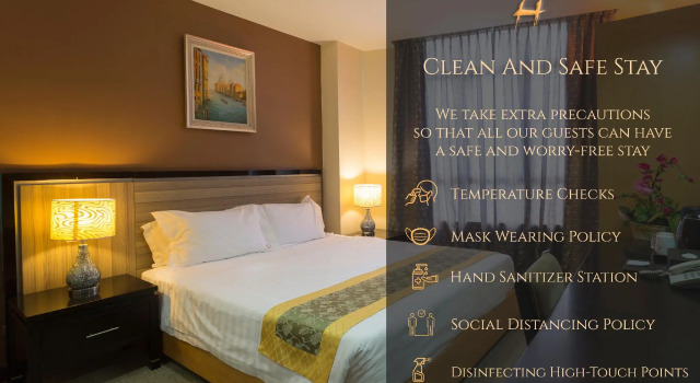 Кровать в общем номере Hallmark View Hotel
