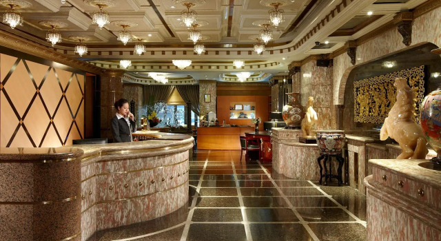 Кровать в общем номере Taipei Charming City Hotel