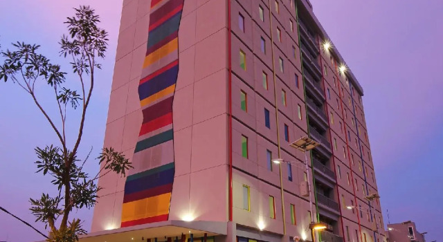 Кровать в общем номере TreePark Hotel BSD City