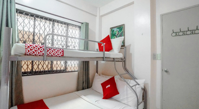 Кровать в общем номере OYO 748 Baguio Transient Dot Com
