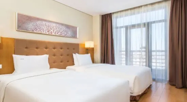 Люкс с 2 комнатами Wanda Jin Suites Changbaishan