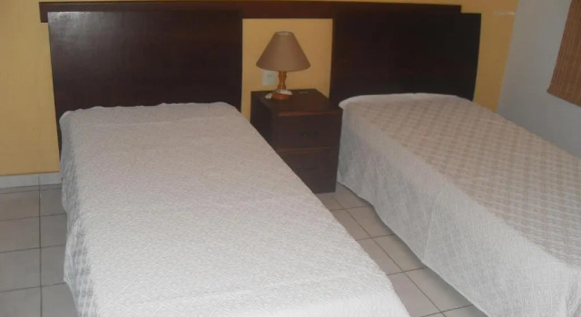 Четырёхместный номер Superior с балконом и с красивым видом из окна Hotel Pousada Caminho da Praia