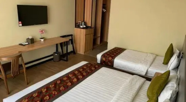 Номер Deluxe Wing Tat Grand Hotel