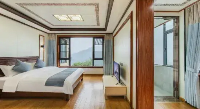 Кровать в общем номере Anji Liujian Fairyland Leisure Beauty Hotel