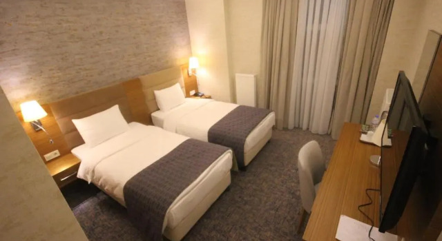 Четырёхместный номер Deluxe Garden Zara Hotel