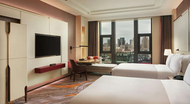 Четырёхместный номер Deluxe Conrad Tianjin