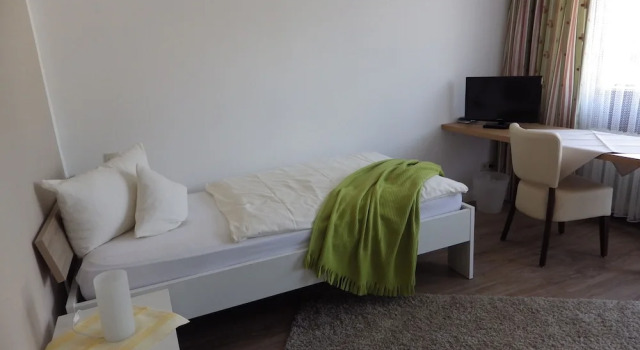 Одноместный номер Economy с балконом и с видом на сад Pension Haus Heitzig