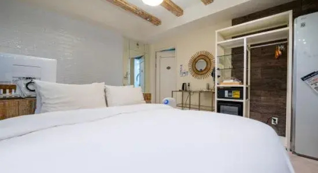 Двухместный люкс с 2 комнатами с частичным видом на океан SongJeong Lesign Hotel