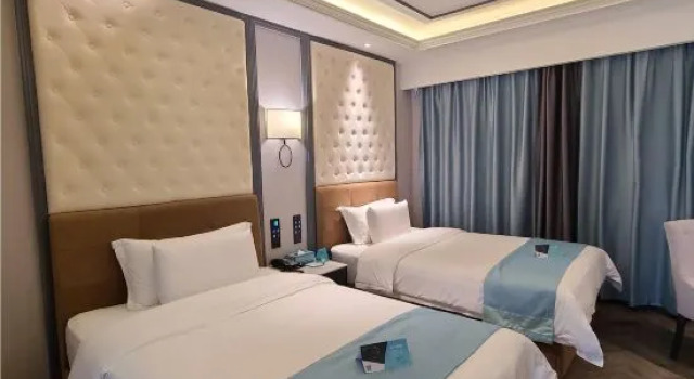 Люкс Deluxe Мансарда Xana Hotelle (Yichunshi Zhengfu Railway Station)
