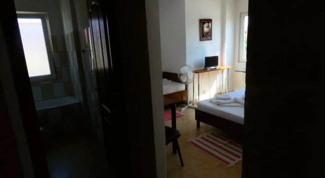 Трёхместный семейный номер Standard Taxi Hostel