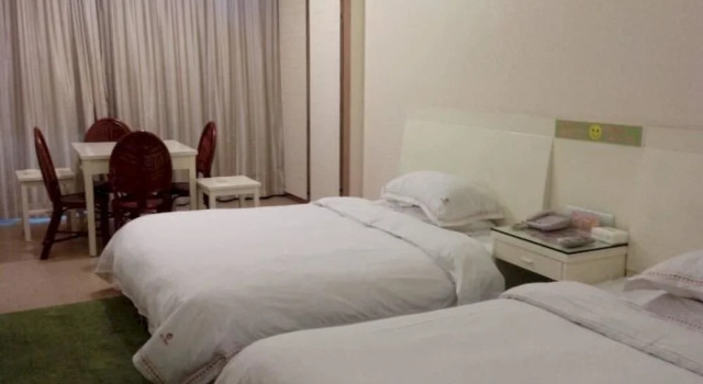 Jingjiang Shuiyue Qinghua Hotel, Prenota Hotel Jingjiang Jiangsu