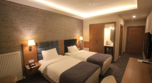 Четырёхместный номер Deluxe Garden Zara Hotel