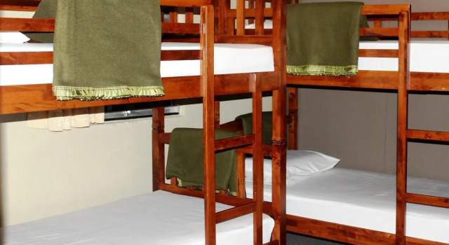 Кровать в общем номере Jabez Kinabalu Inn