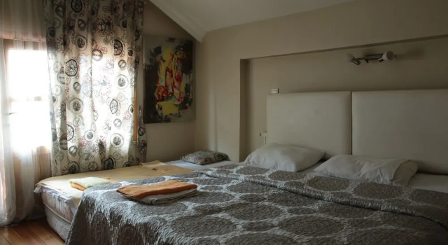 Трёхместный номер Standard с балконом Eagles Budget Homes