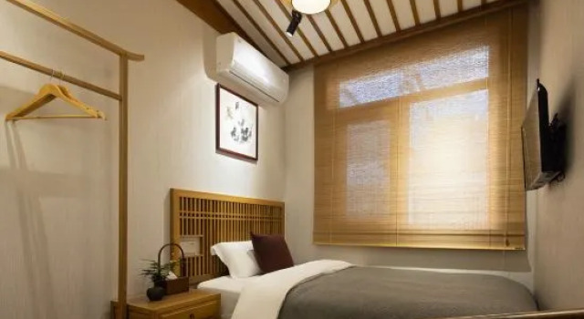 Капсула Wuyuan Half Mu Fangtang Homestay