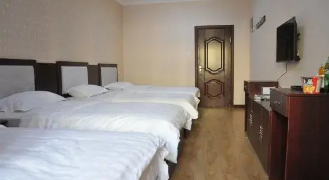 Кровать в общем номере Jinshan Express Hotel