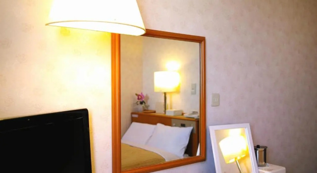 Кровать в общем номере (женский номер) Tourist Hotel Hitachi
