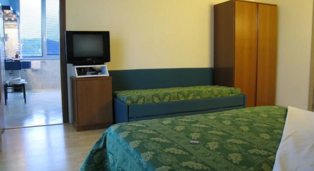 Четырёхместный номер Superior с балконом Albergo Boomerang