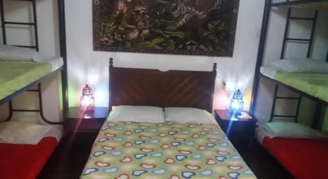 Кровать в общем номере Hostal Mirador Andino