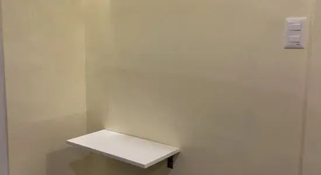 Łóżko w pokoju wieloosobowym Cozy Coron Inn