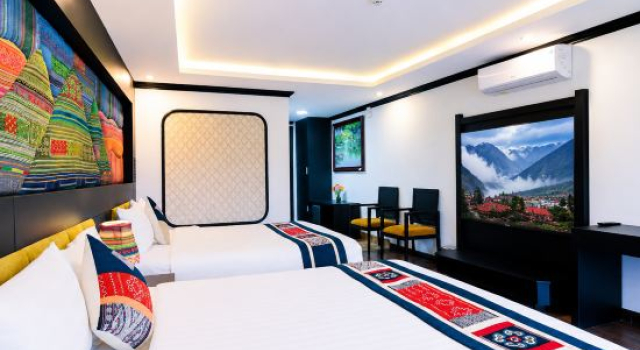 Кровать в общем номере Babeeni Family Hotel Sapa