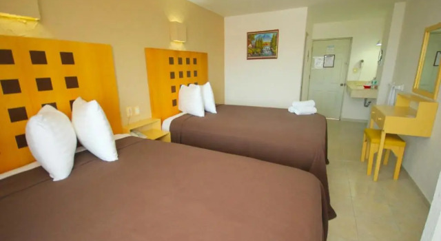 Четырёхместный номер Standard Hotel Posada del Carmen