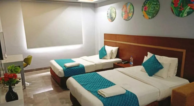 Номер Deluxe Asian Suites IFFCO Metro Station Gurugram