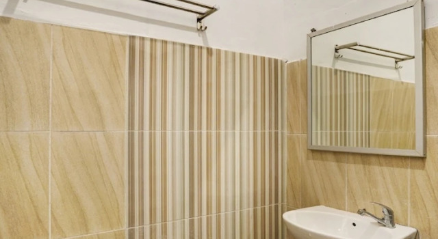 Economy Zimmer OYO 90645 Karisma Residence