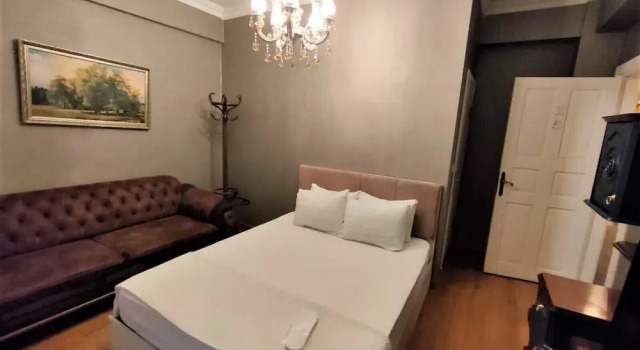 Номер Valide i Suit