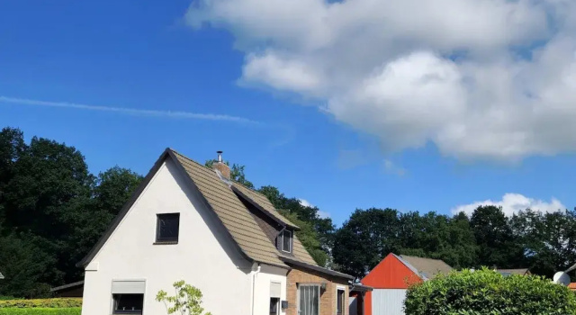 Коттедж Charmantes Ferienhaus mit Kamin in Lintig