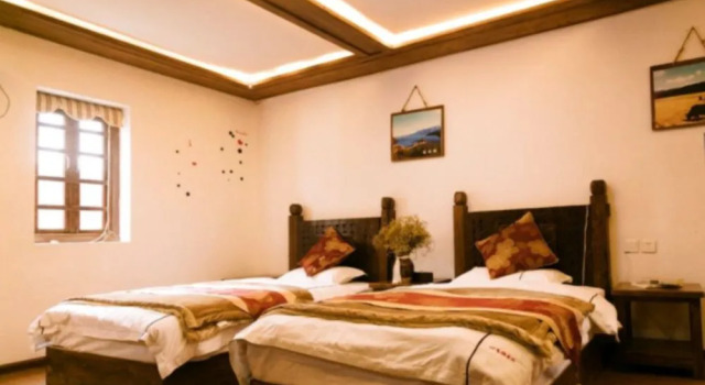 Lijiang Pengyouquan Inn, Забронировать Отель Лицзян Юньнань, рядом с Улица Сквер-стрит Древнего города Даянь