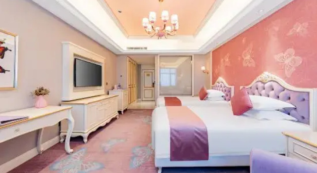 Кровать в общем номере Baotou Shimao Hotel