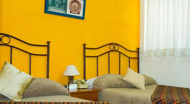 Четырёхместный номер Standard Hotel Casa Flores de Tikal