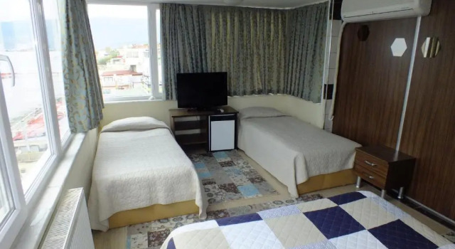 Четырёхместный номер Standard с видом на море Kutlugun Sahil Otel