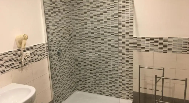 Четырёхместный номер Standard с балконом Simonettas Rooms