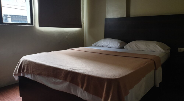 OYO 1011 First Hotel, Забронировать Отель Манила 