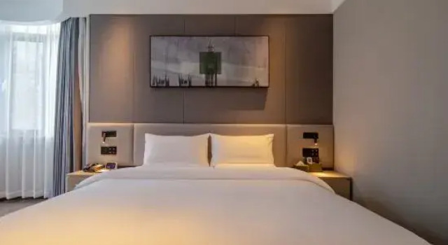Люкс Business с видом на сад Shankee Coffee Style Hotel (Huangdao Golden Beach Tianmushan Road Subway Station)