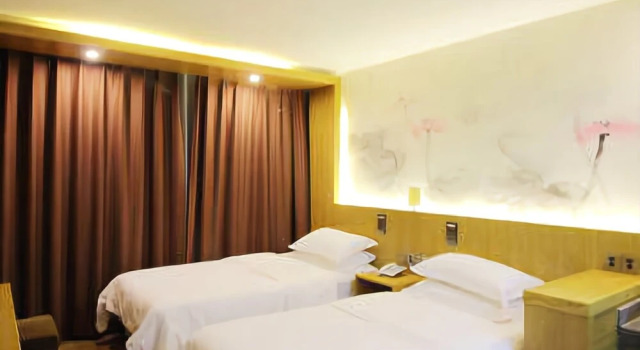 Junpin Coastal Hotel (Qingdao Railway Station Subway Station Zhanqiao Branch)(君品海岸酒店（青岛火车站地铁站栈桥店）)