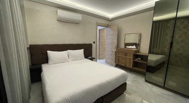 Апартаменты Le Luxe Suites Hotel