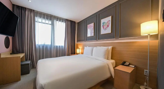 Кровать в общем номере (женский номер) Отель Vella Suite Suwon