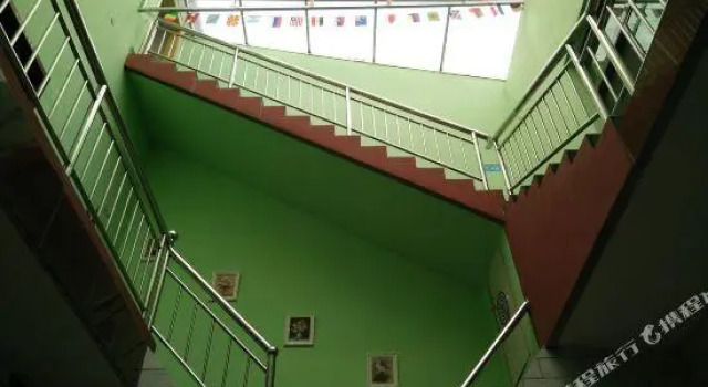 Кровать в общем номере Huashanyi Loft Youth Hostel