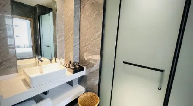 Двухместный люкс Jiangyouxing Angsana Hotel (Fangte Oriental Shenhua Branch)